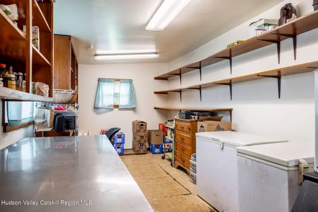 a view of a table and chairs in the garden