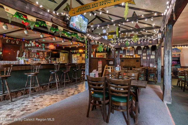 a view of a chairs and table in a patio
