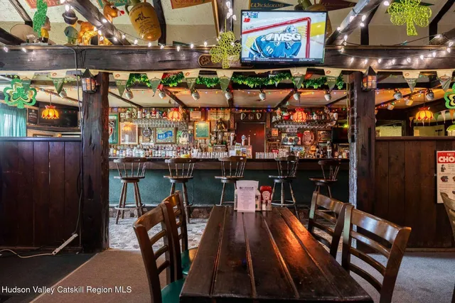 a view of a chairs and tables in the patio