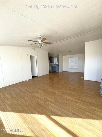 a view of a kitchen counter top space and wooden floor