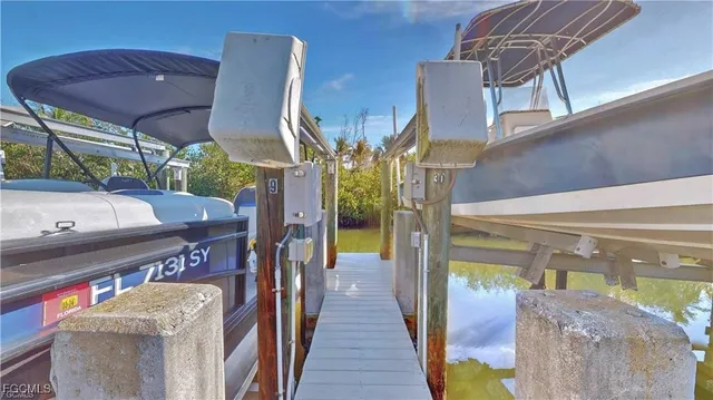 a view of a balcony with chairs