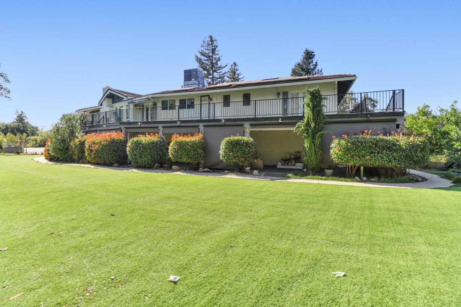 4330 Cavitt Stallman Road Granite Bay, CA 95746 - Photo 55 of 85 a view of a house with a backyard