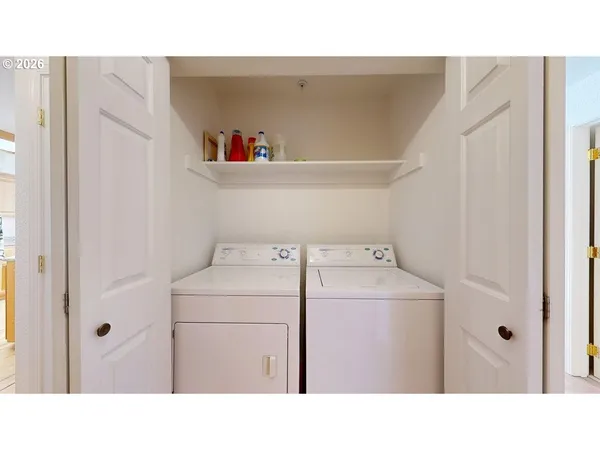 a utility room with dryer and washer