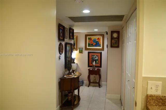 a view of a hallway with workspace
