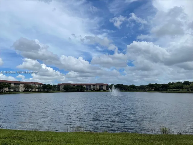 a view of a lake from a yard