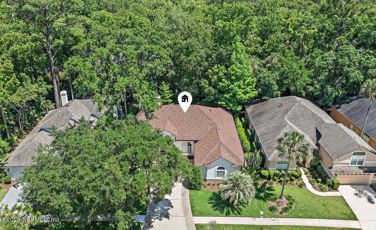 840 Mill Stream Road Ponte Vedra Beach, FL 32082 - Photo 23 of 29 an aerial view of a house with outdoor space and trees all around
