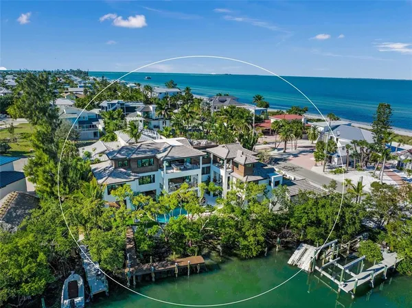 a view of a chairs and table in a patio