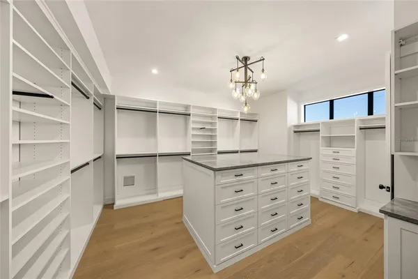 a bathroom with a toilet sink and a mirror