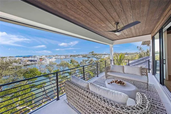 a bedroom with two beds and a flat screen tv