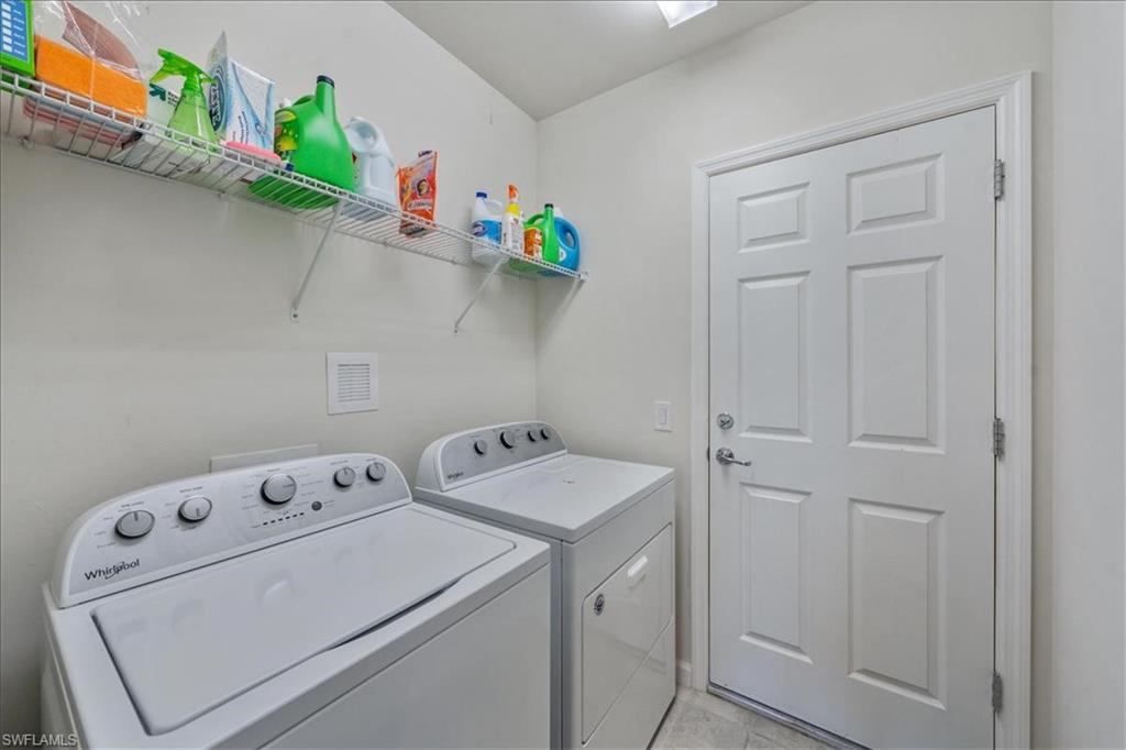 4596 Lamaida Lane Immokalee, FL 34142 - Photo 16 of 22 a utility room with dryer and washer