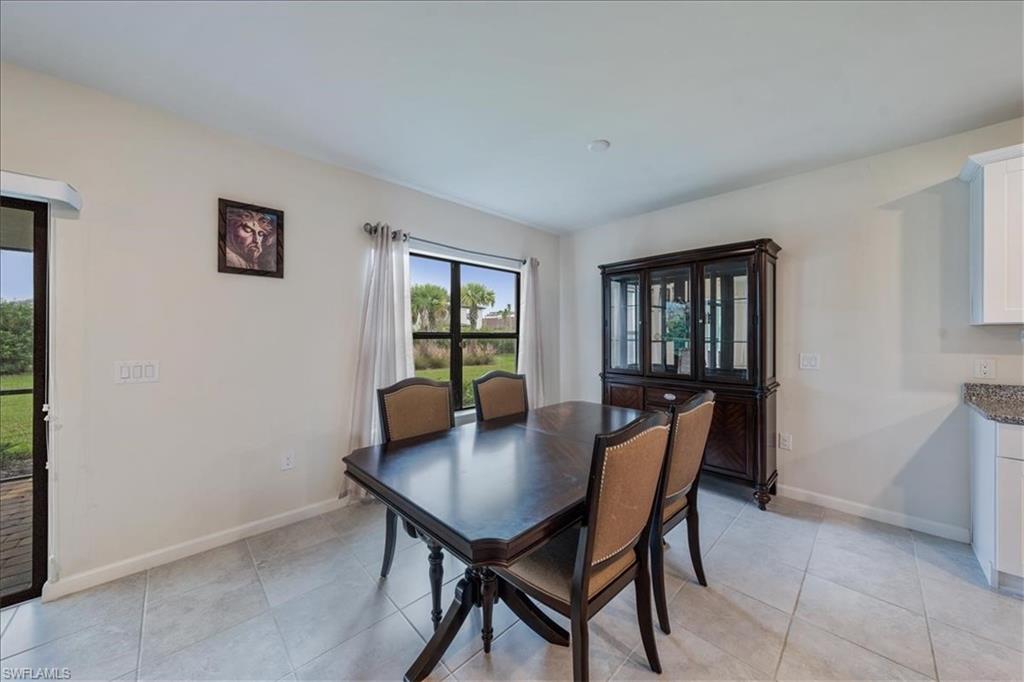 4596 Lamaida Lane Immokalee, FL 34142 - Photo 6 of 22 a dining room with furniture and window