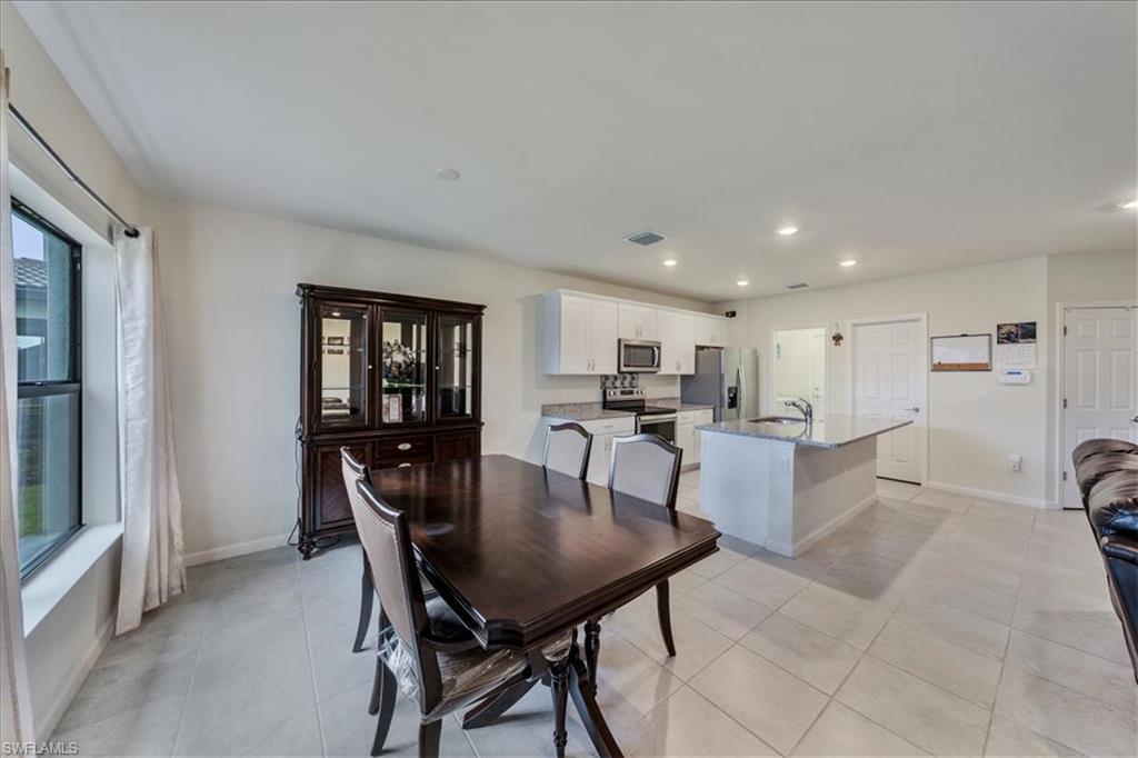 4596 Lamaida Lane Immokalee, FL 34142 - Photo 8 of 22 a dining room with furniture and window