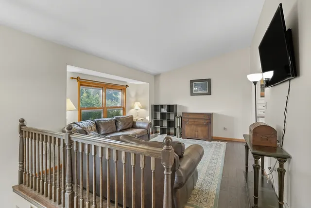 a view of a living room and windows