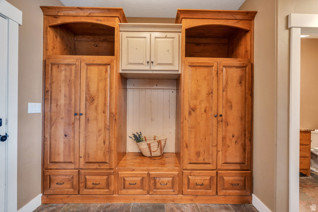 1355 West 1000 South Mapleton, UT 84664 - Photo 25 of 74 Mudroom featuring baseboards and dark stone finish flooring