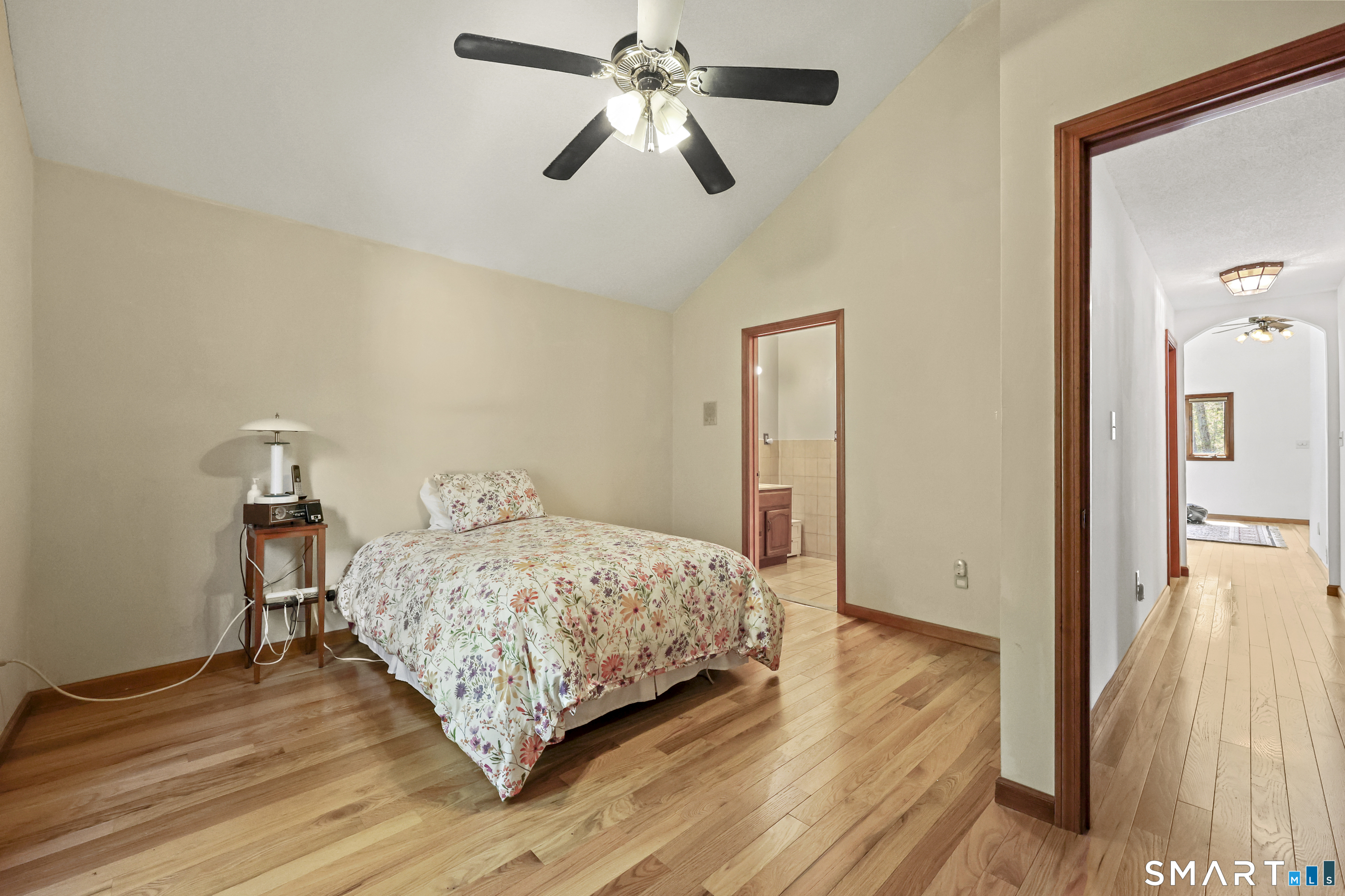 419 Birge Park Road Harwinton, CT 06791 - Photo 16 of 36 a bedroom with a bed and wooden floor