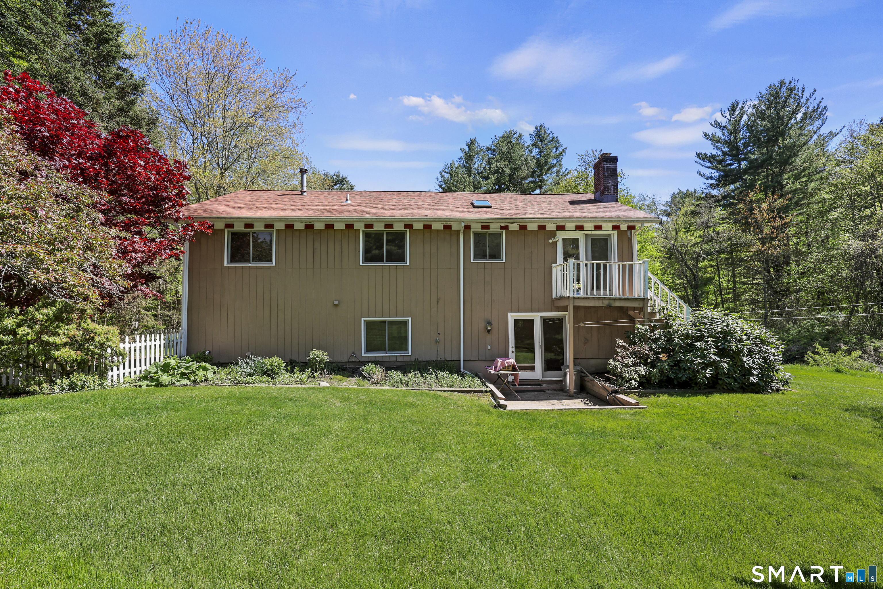 419 Birge Park Road Harwinton, CT 06791 - Photo 27 of 36 a view of a house with backyard sitting area and garden