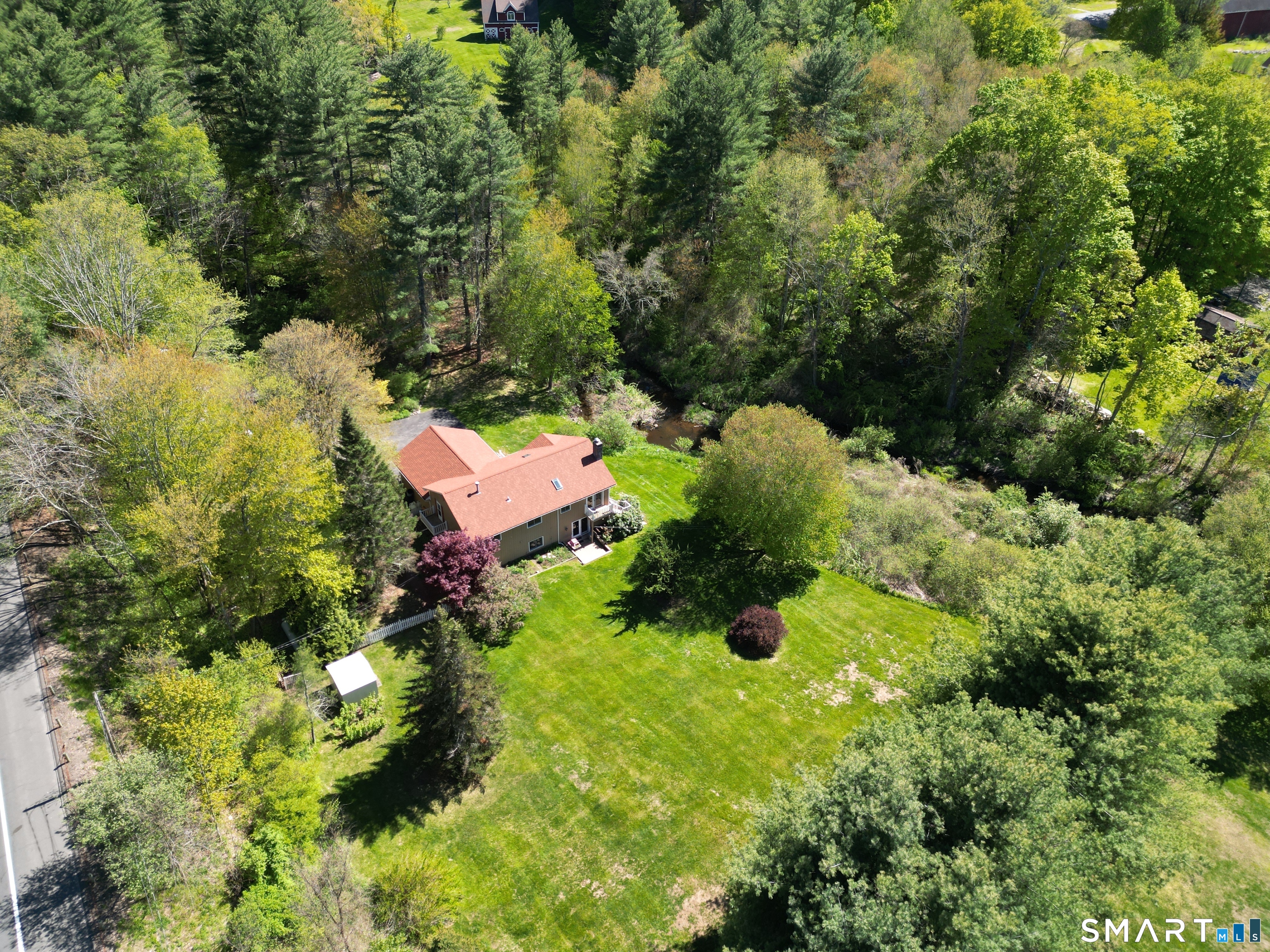 419 Birge Park Road Harwinton, CT 06791 - Photo 34 of 36 an aerial view of a house with yard and outdoor seating
