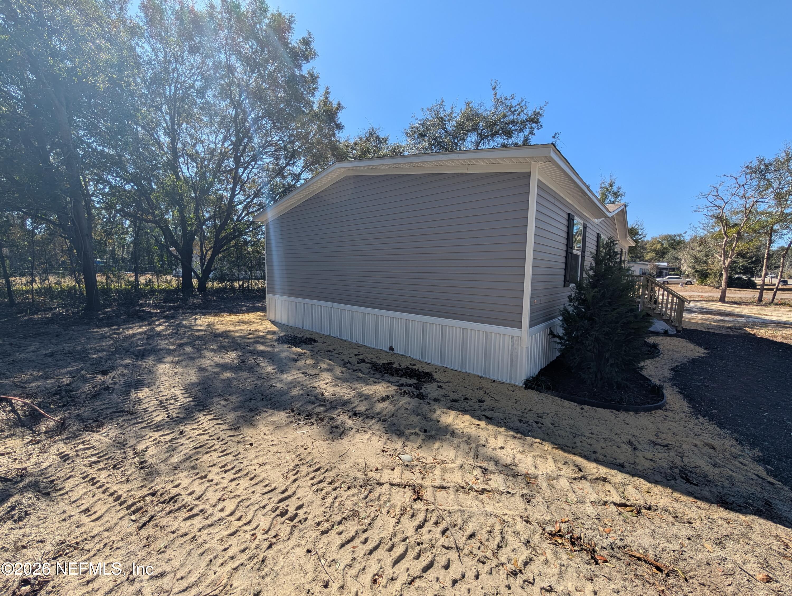 207 Ash Street Interlachen, FL 32148 - Photo 7 of 21 East Side View