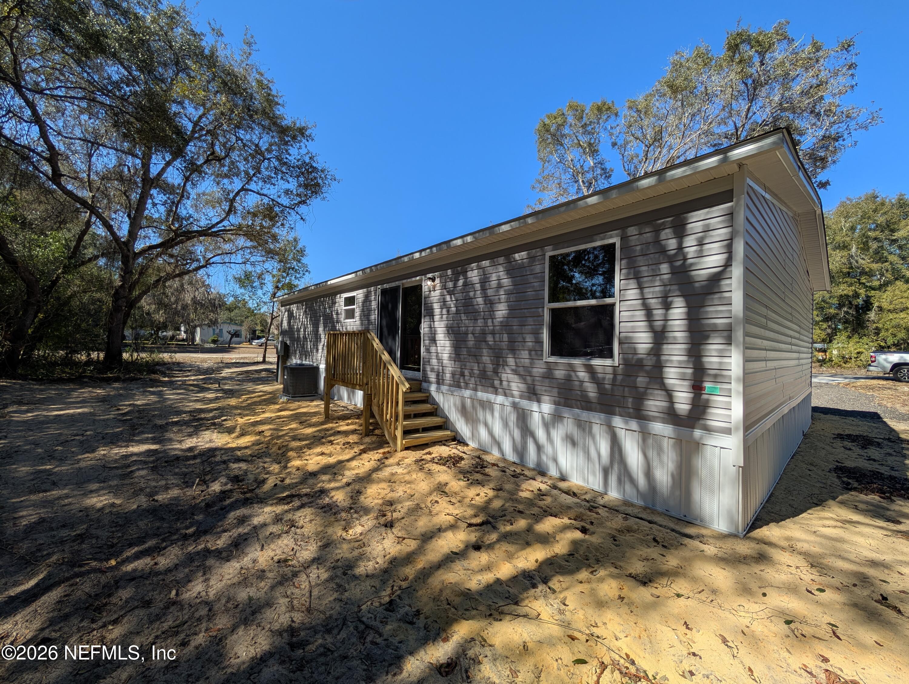 207 Ash Street Interlachen, FL 32148 - Photo 9 of 21 Rear View