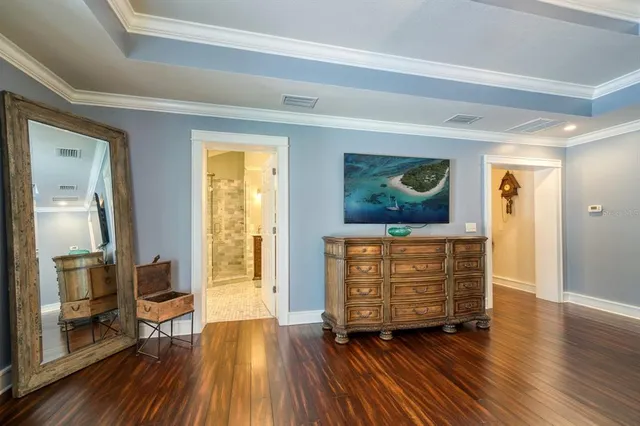 a room with furniture and wooden floor