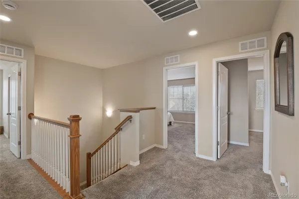 a view of a livingroom with a staircase