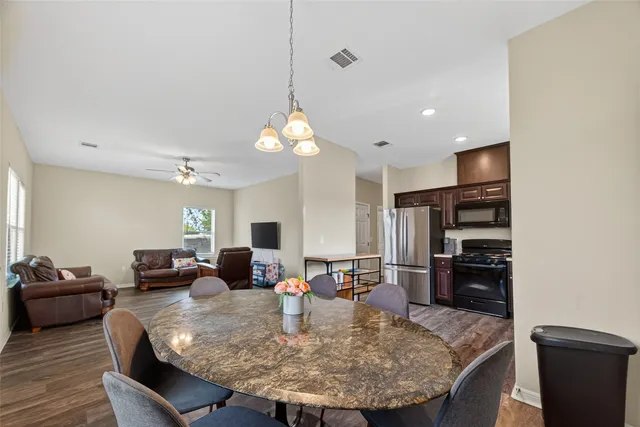 a view of a dining room with furniture
