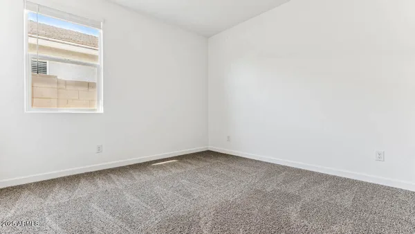 a view of a room that has a window