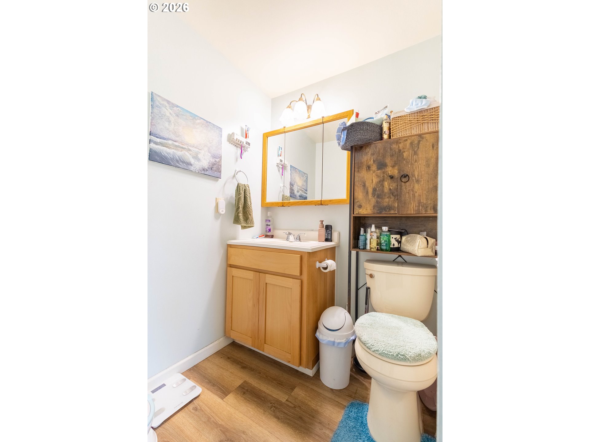 63150 Booth Lane La Grande, OR 97850 - Photo 15 of 29 a bathroom with a granite countertop toilet sink and mirror