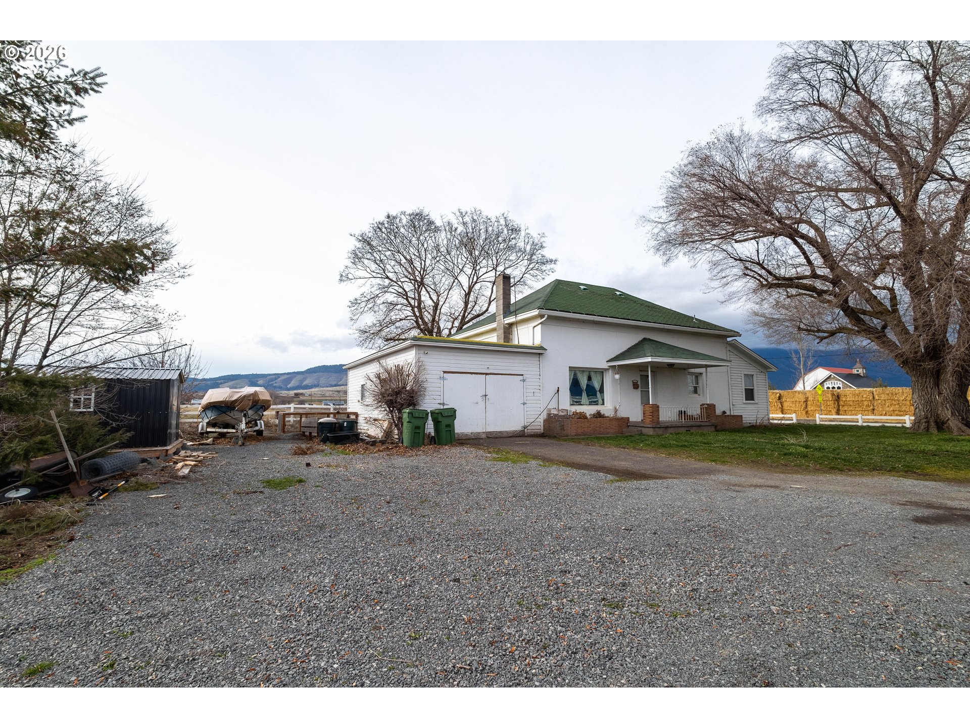 63150 Booth Lane La Grande, OR 97850 - Photo 21 of 29 a view of a house with a yard