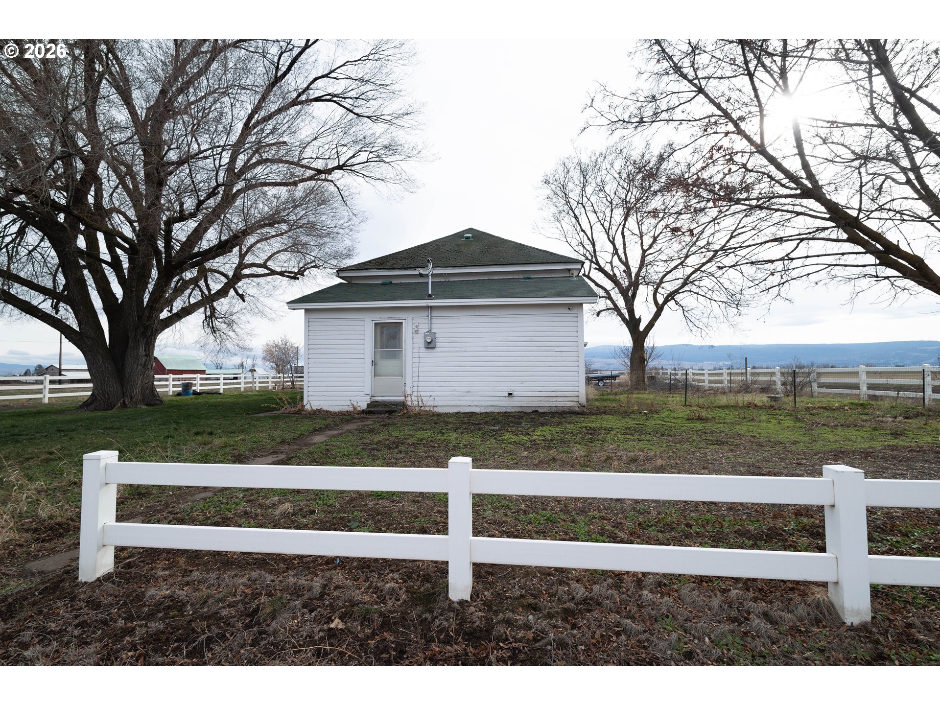 63150 Booth Lane La Grande, OR 97850 - Photo 24 of 29 a front view of a house with a yard