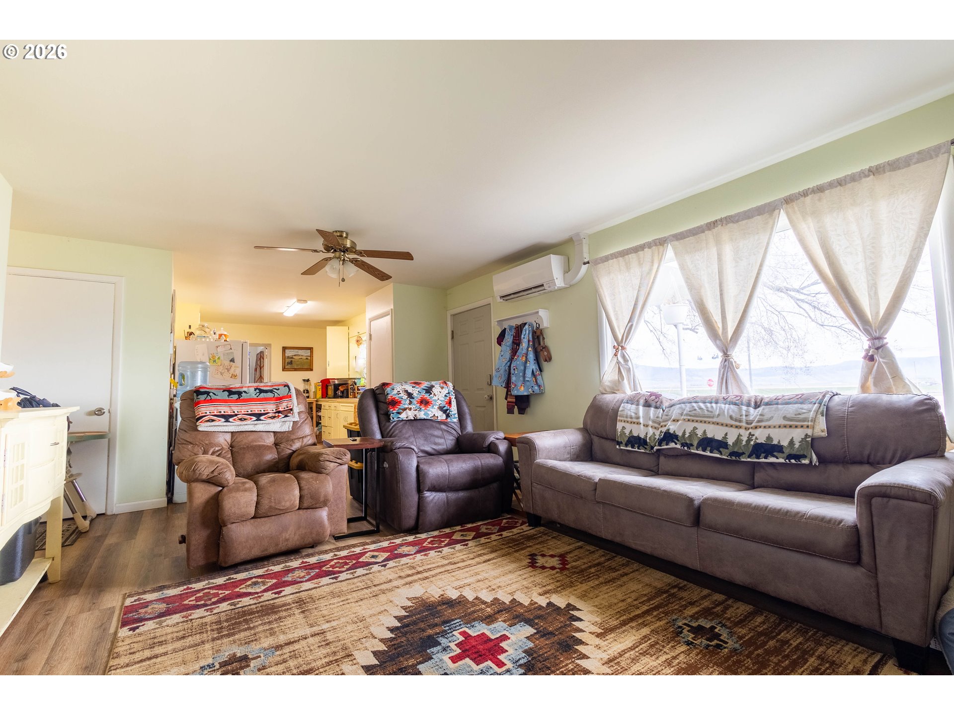 63150 Booth Lane La Grande, OR 97850 - Photo 6 of 29 a living room with furniture and a large window