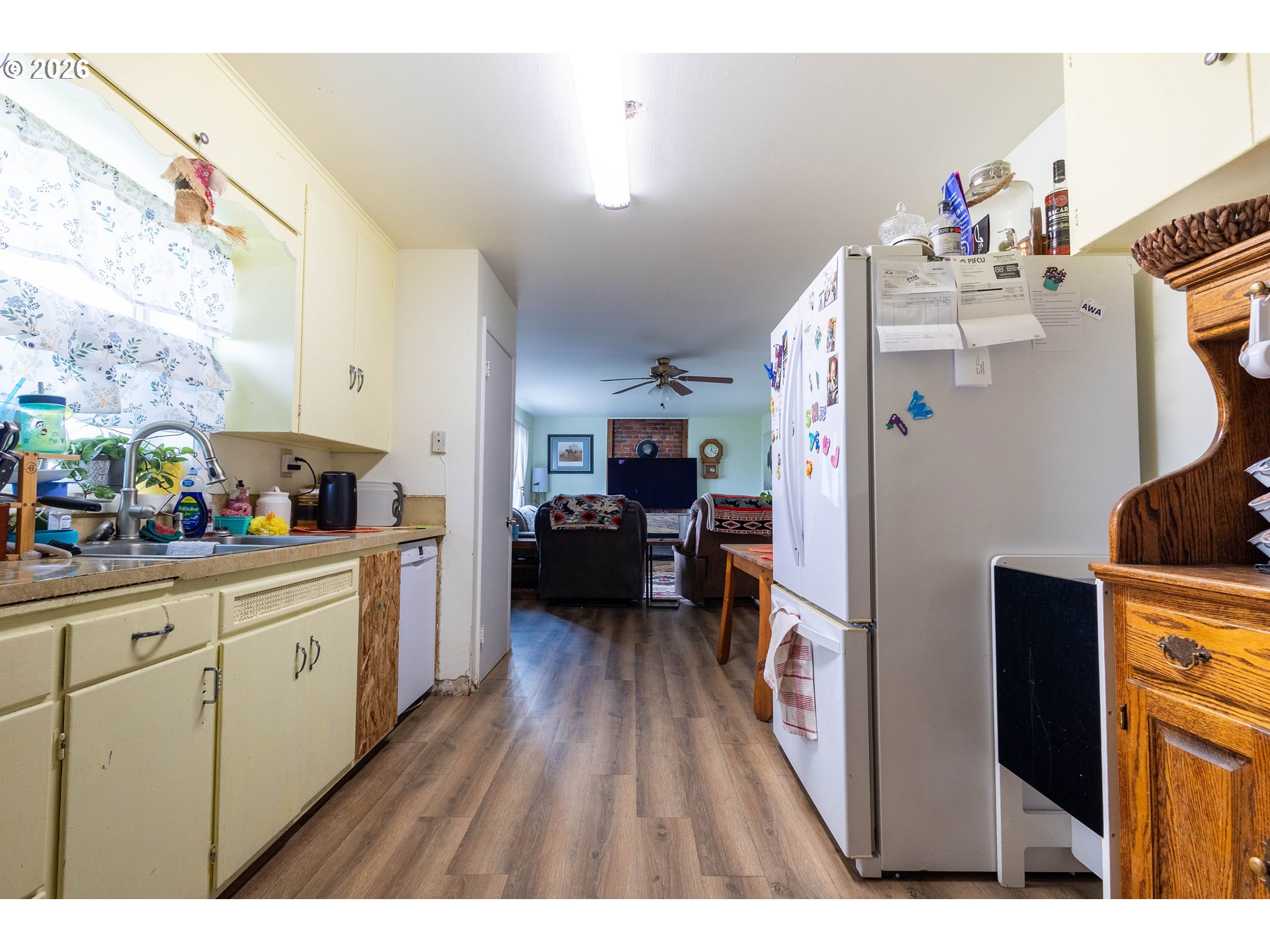 63150 Booth Lane La Grande, OR 97850 - Photo 10 of 29 a kitchen with a refrigerator and a stove
