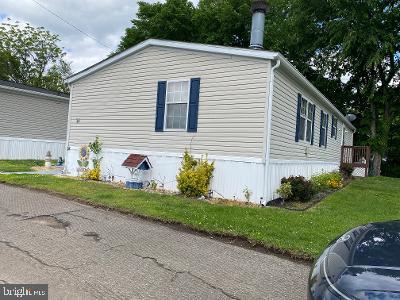 14 Thomas Lane Sparrows Point, MD 21219 - Photo 2 of 26 a view of a house with a yard and a garage
