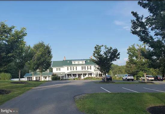 11843 Linden Chapel Road Clarksville, MD 21029 - Photo 126 of 128 a view of a street with a building in the background