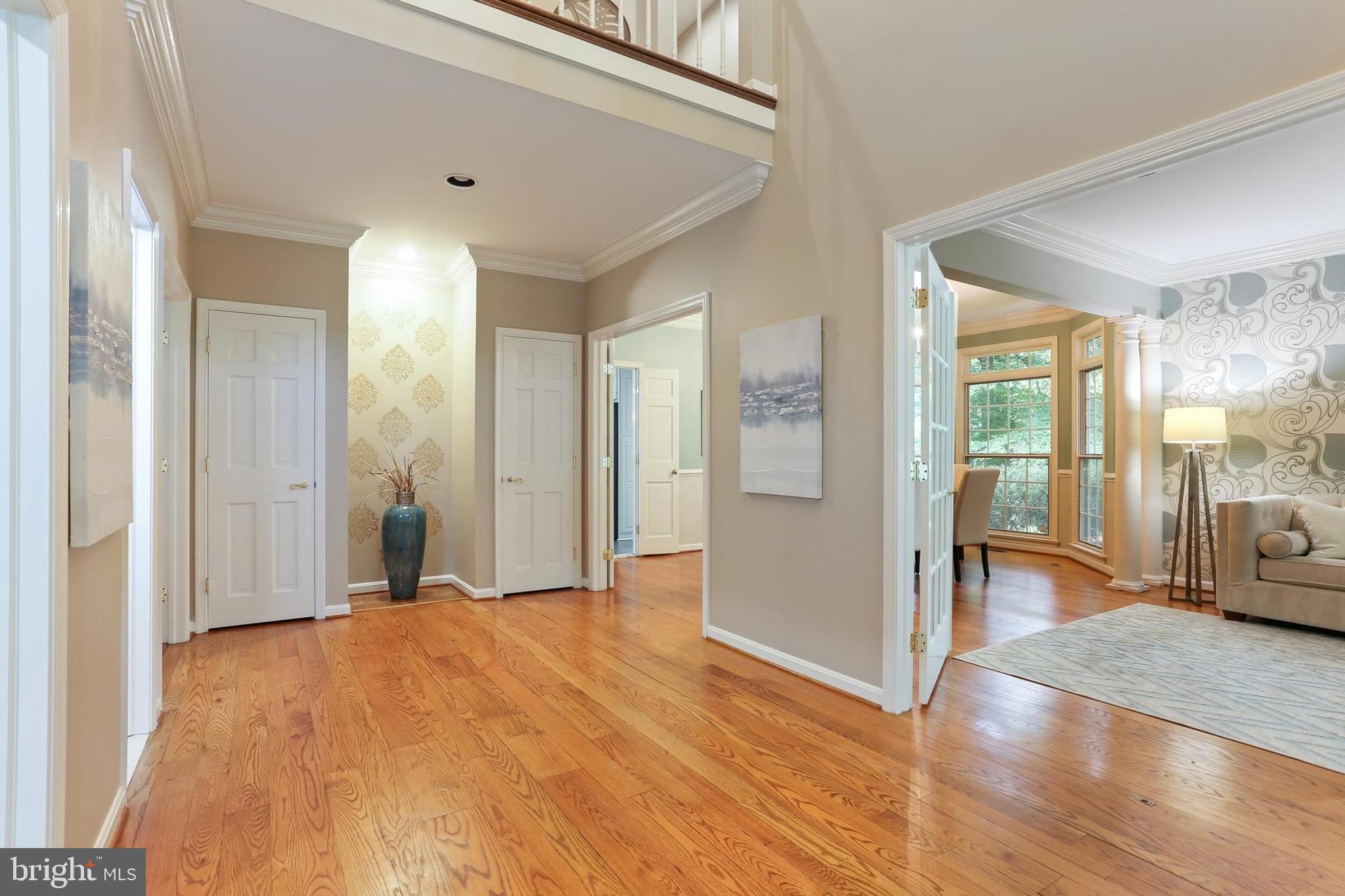 11843 Linden Chapel Road Clarksville, MD 21029 - Photo 13 of 128 a view of a livingroom with wooden floor and a bathroom