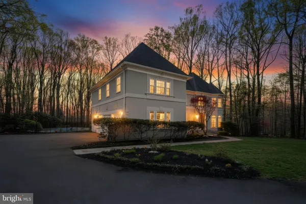 a big yard with lots of green space and trees