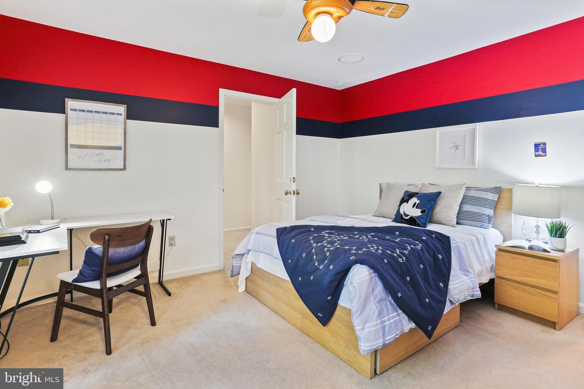 11843 Linden Chapel Road Clarksville, MD 21029 - Photo 55 of 128 a spacious bedroom with a bed and a chair