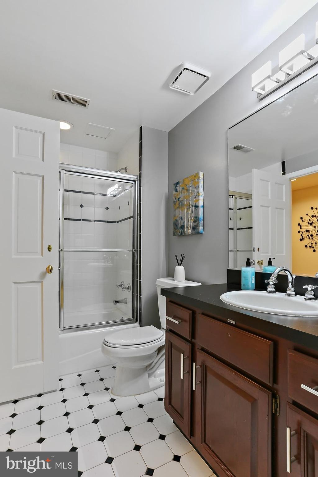 11843 Linden Chapel Road Clarksville, MD 21029 - Photo 84 of 128 a bathroom with a sink a toilet and shower