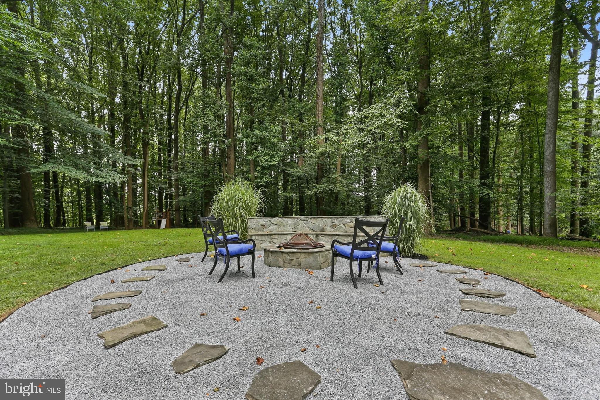 11843 Linden Chapel Road Clarksville, MD 21029 - Photo 95 of 128 Fire pit, stone seating wall, and kids playground