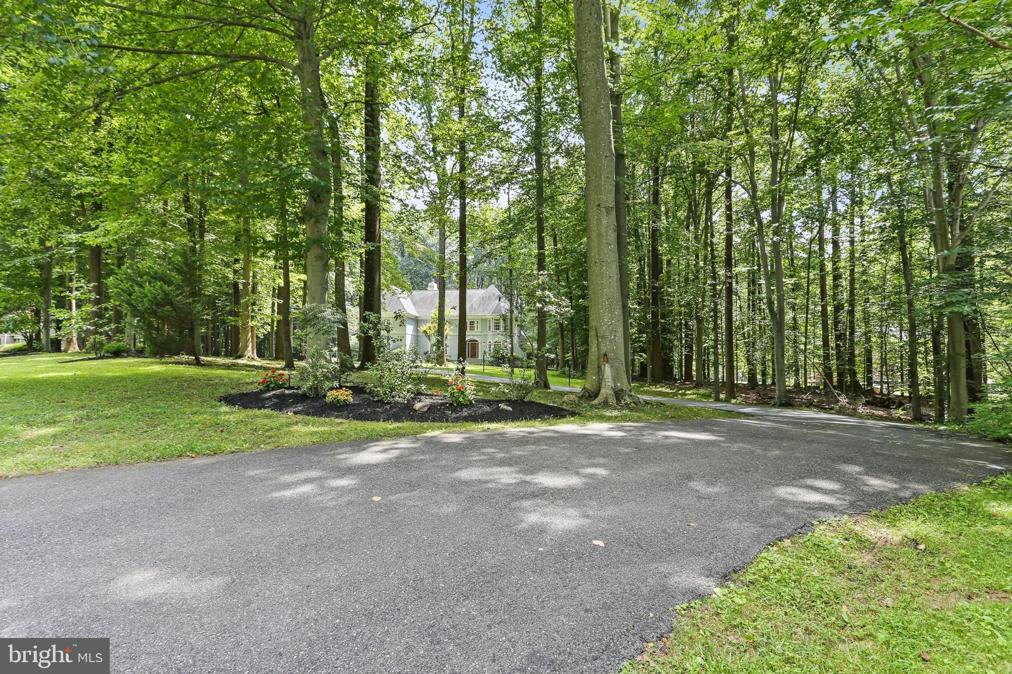 11843 Linden Chapel Road Clarksville, MD 21029 - Photo 100 of 128 a view of a house with a big yard and palm trees