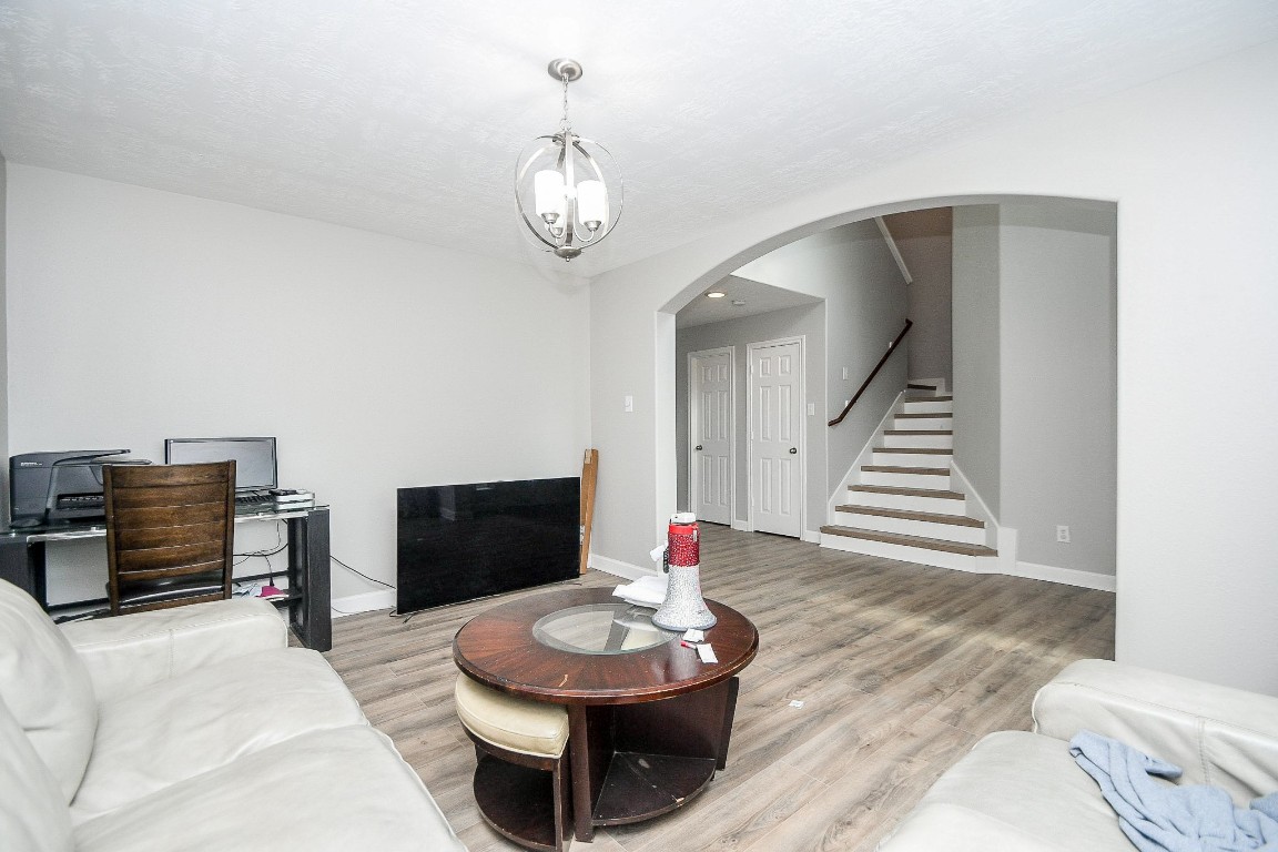 16402 Great Ridge Court Houston, TX 77083 - Photo 7 of 20 a living room with furniture and a fireplace