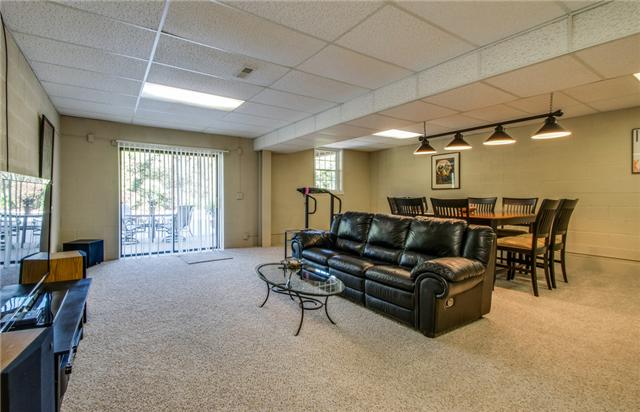 1979 Baker Road Goodlettsville, TN 37072 - Photo 15 of 20 Huge Den/Family Room in finished basement area has dry bar and half bath.(Easy access from pool!!!) Opens to poolside patio.