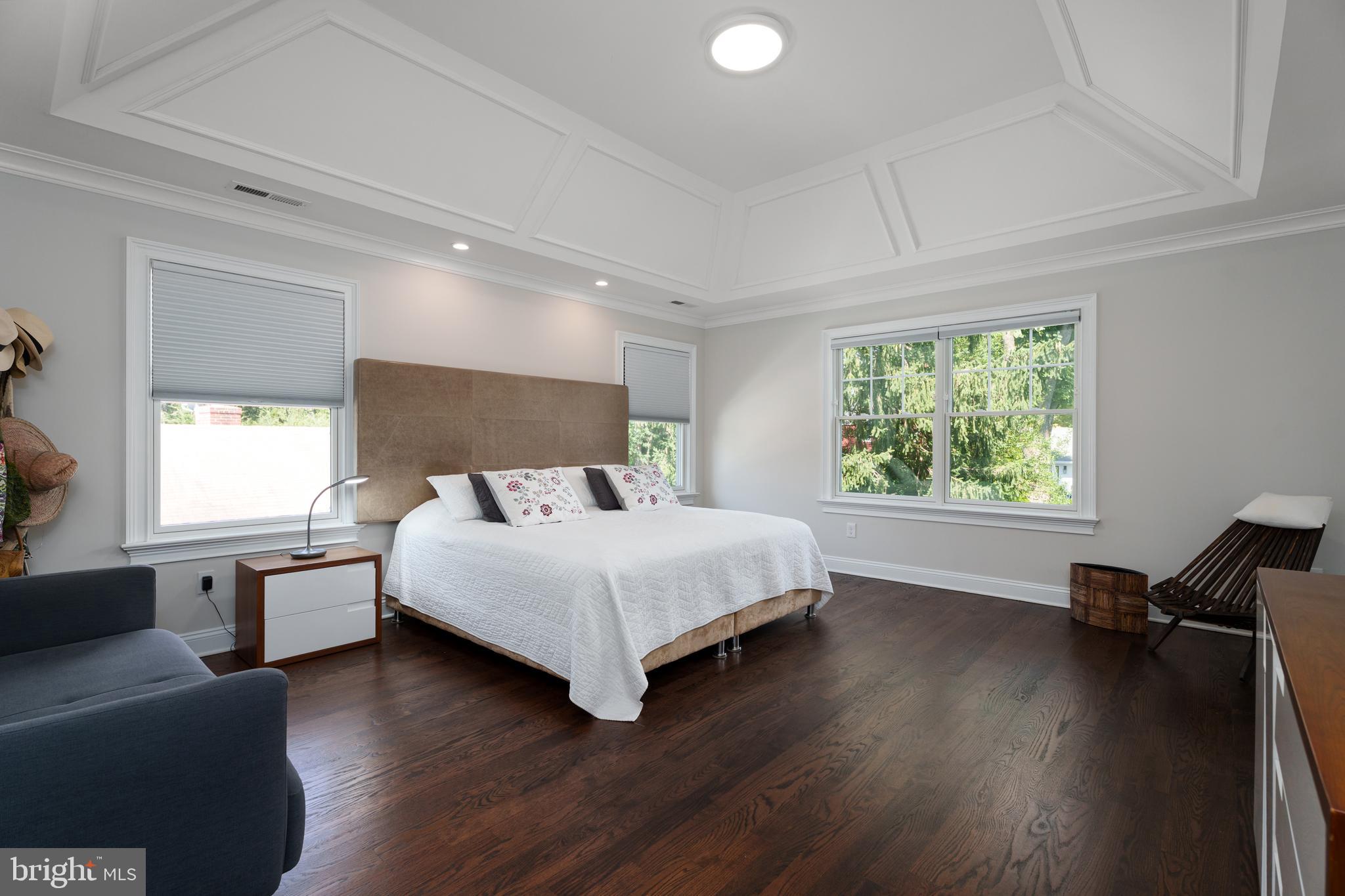 28 Hillside Road Princeton, NJ 08540 - Photo 17 of 31 a white bed sitting in a spacious bedroom next to a window