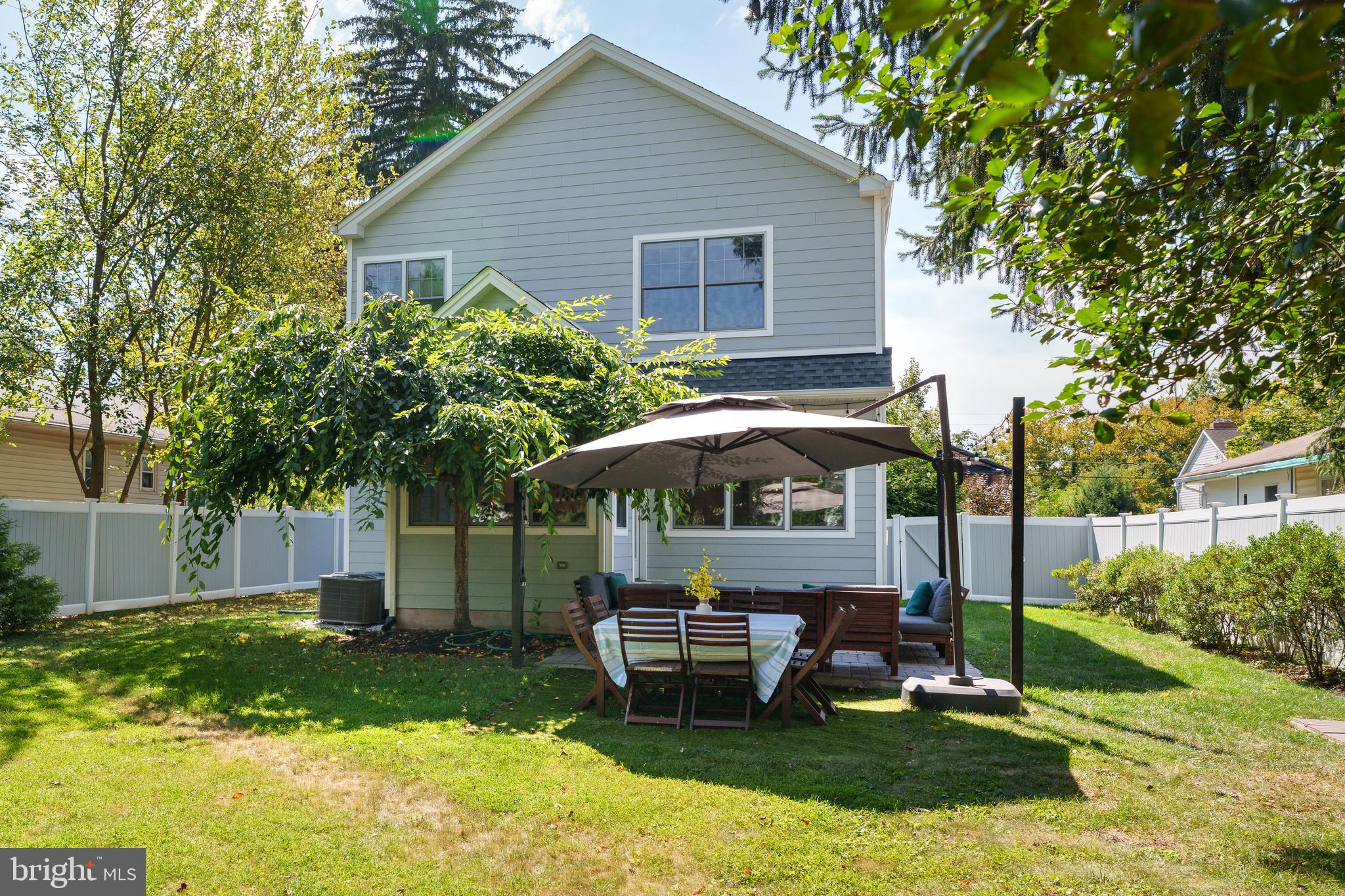 28 Hillside Road Princeton, NJ 08540 - Photo 29 of 31 a view of a house with backyard and sitting area