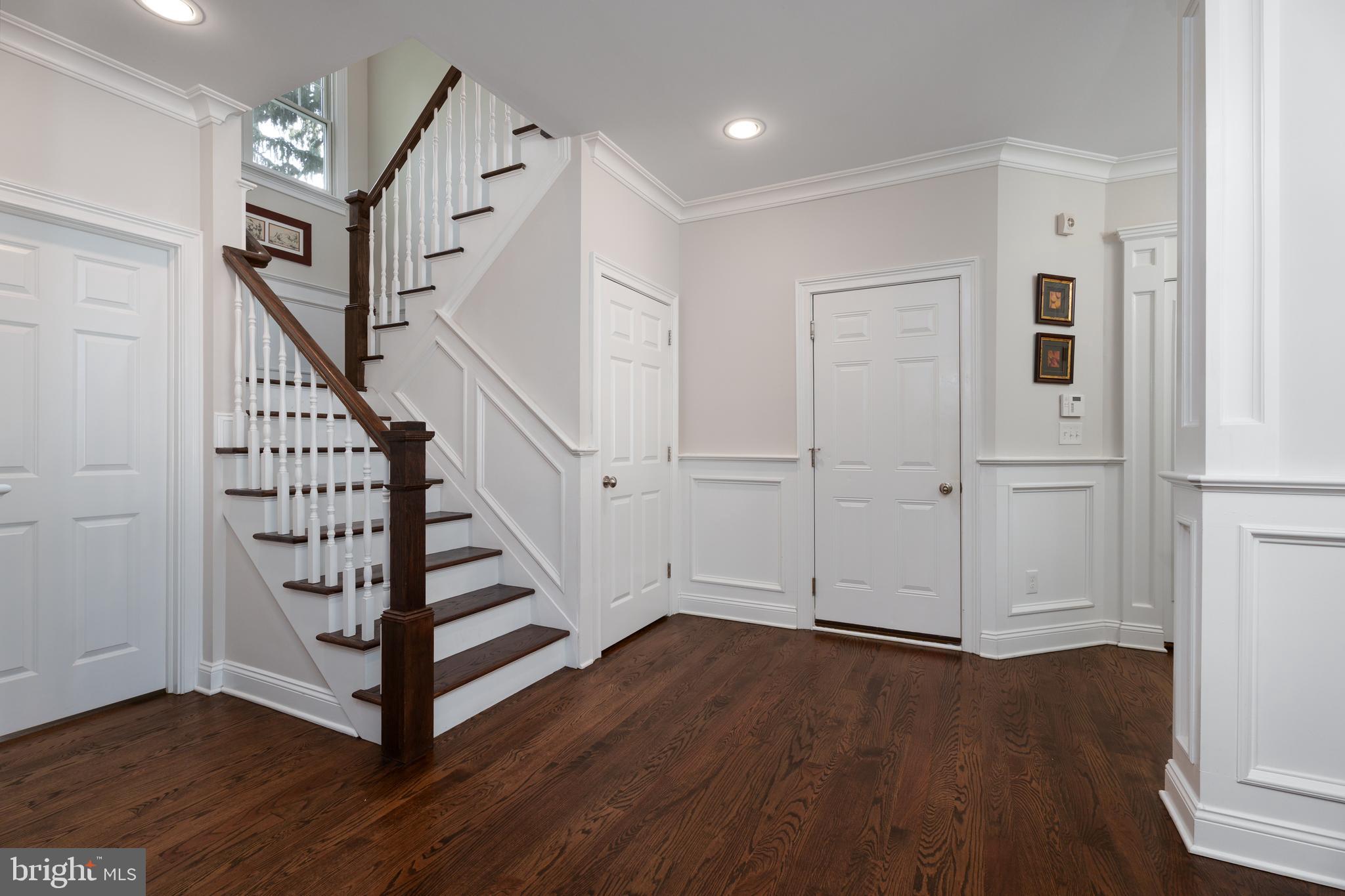 28 Hillside Road Princeton, NJ 08540 - Photo 4 of 31 a view of a hallway with wooden floor and entryway