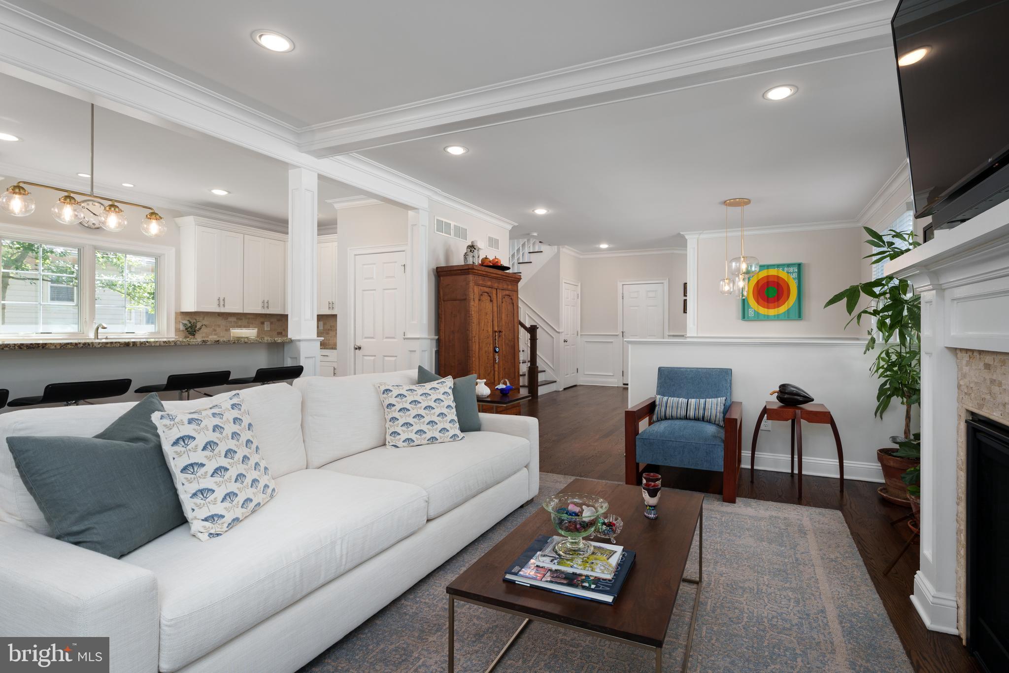 28 Hillside Road Princeton, NJ 08540 - Photo 10 of 31 a living room with furniture and a flat screen tv