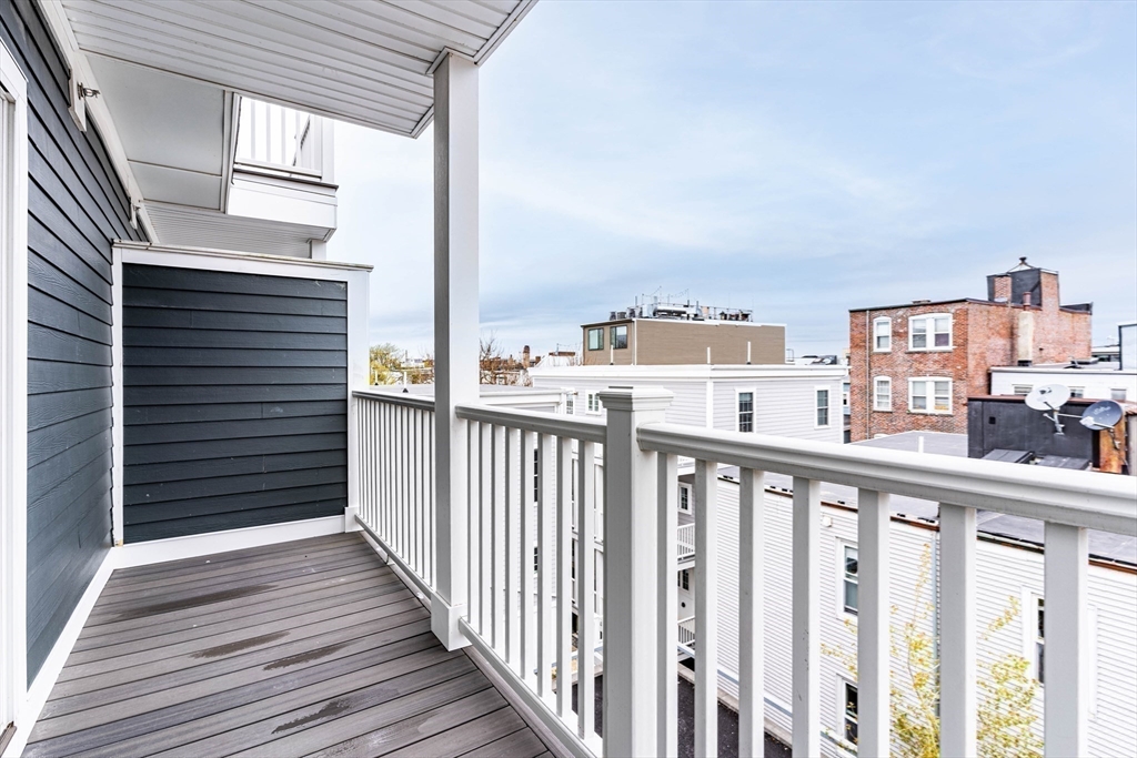 106 Webster Street, Unit 201 Boston, MA 02128 - Photo 25 of 33 a view of city from a balcony