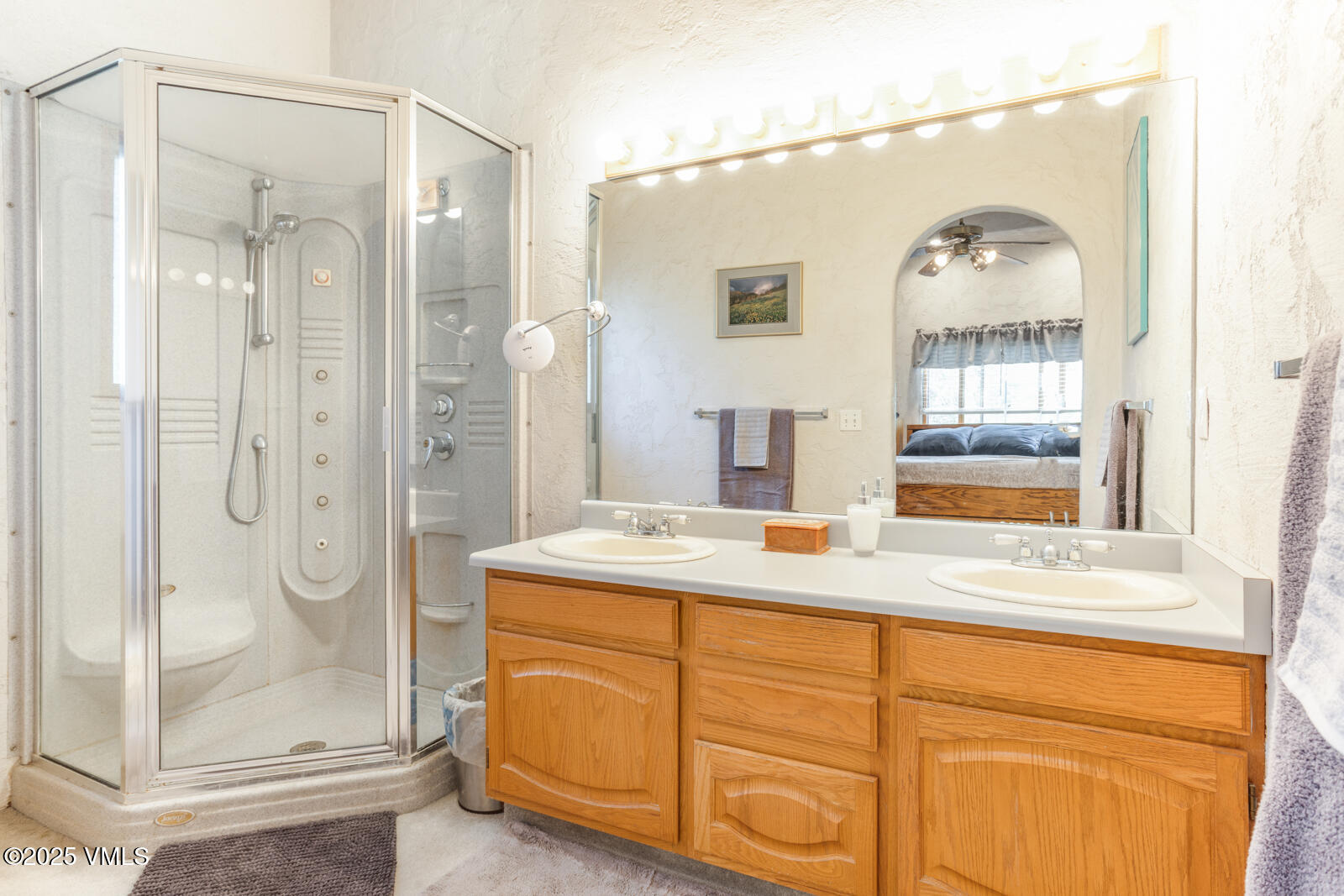 20 Hereford Road Edwards, CO 81632 - Photo 18 of 32 a bathroom with a shower sink and mirror