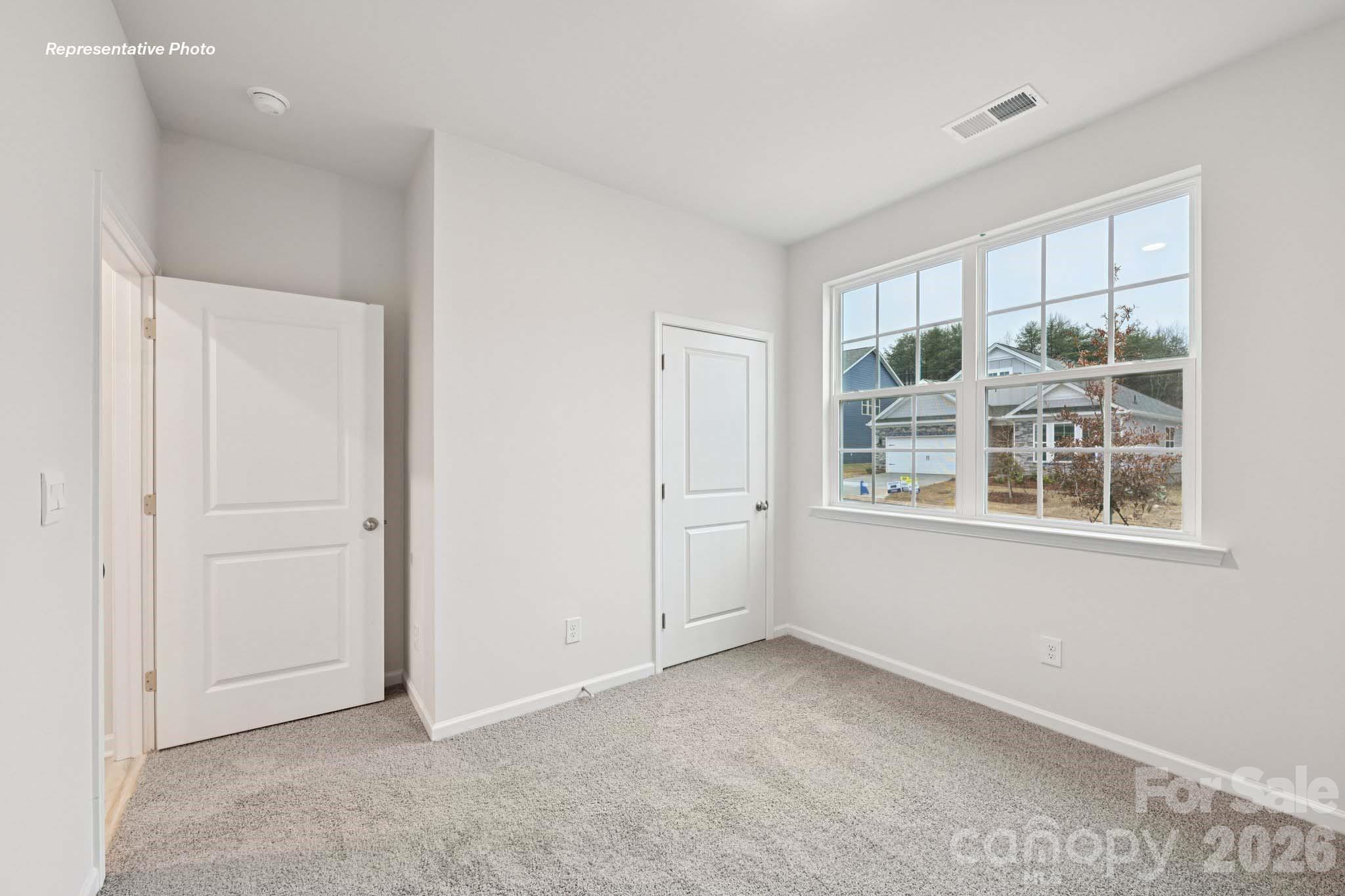 7881 Old Brk Road Sherrills Ford, NC 28673 - Photo 14 of 26 an empty room with windows