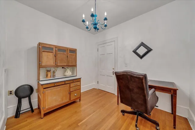 a view of a kitchen with a sink and dishwasher cabinets